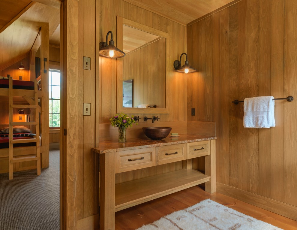 Design ideas for a country kids bathroom in Burlington with medium wood cabinets, brown walls, medium hardwood floors, a vessel sink, brown floor, brown benchtops and recessed-panel cabinets.