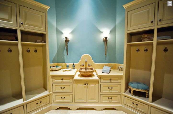 This is an example of a mid-sized arts and crafts bathroom in Dallas with beaded inset cabinets and quartzite benchtops.