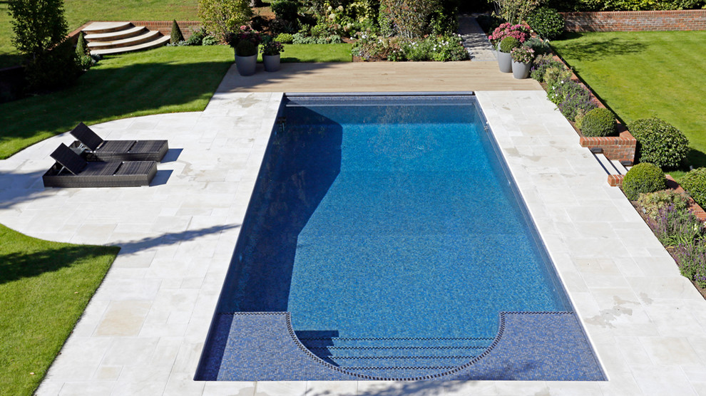 Mid-sized transitional front yard rectangular lap pool in Other.