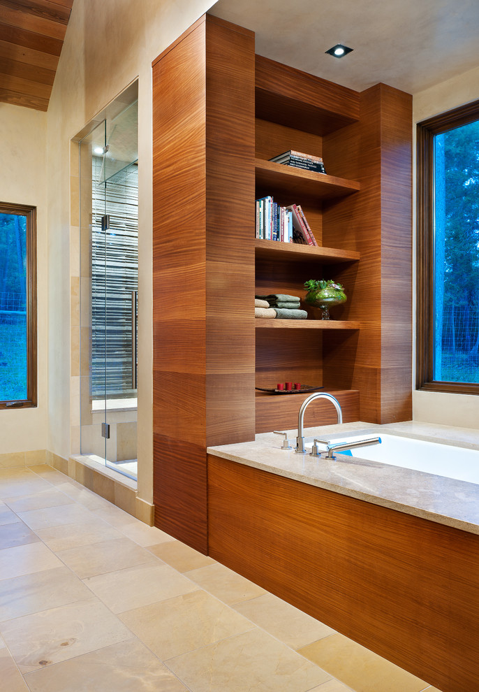 Mid-sized contemporary master bathroom in Other with flat-panel cabinets, dark wood cabinets, an alcove tub, beige walls and ceramic floors.