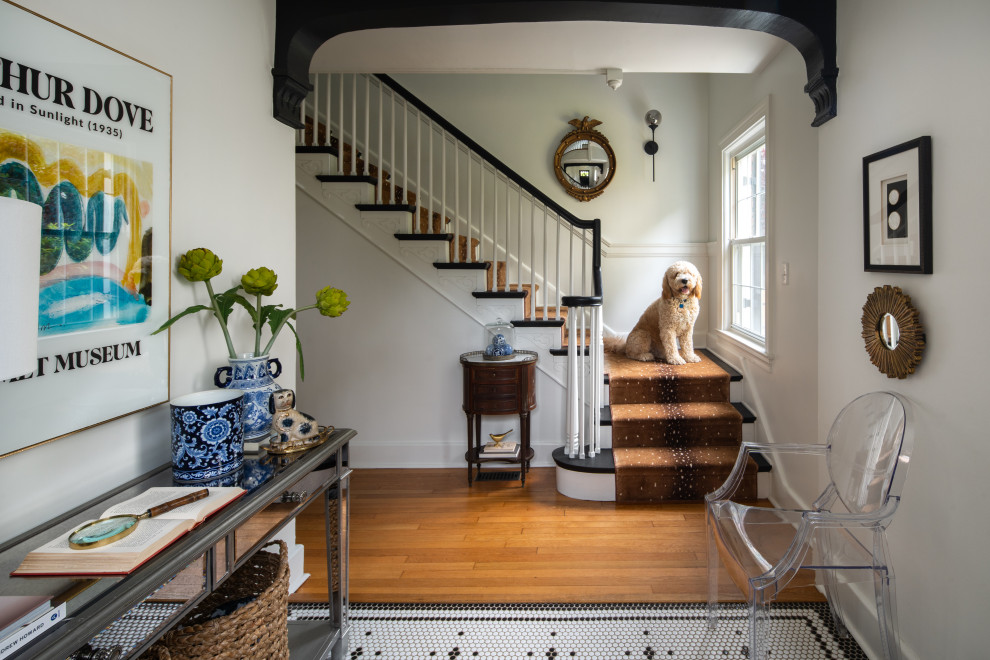 Historic Homeland Full Home Remodel - Inspiration for a transitional painted l-shaped wood railing staircase remodel in Baltimore with painted risers
