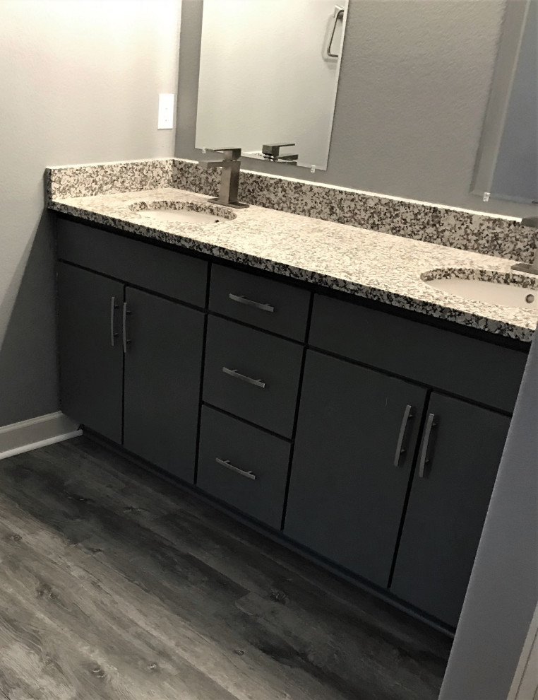 Contemporary 3/4 bathroom in Denver with black cabinets, a corner shower, gray tile, subway tile, grey walls, laminate floors, a drop-in sink, onyx benchtops, grey floor, an open shower, multi-coloured benchtops, a double vanity and a built-in vanity.