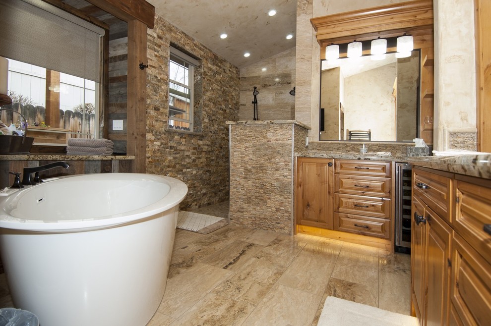 Mid-sized transitional bathroom in Other with an undermount sink, raised-panel cabinets, medium wood cabinets, granite benchtops, a freestanding tub, an open shower, a two-piece toilet and stone tile.