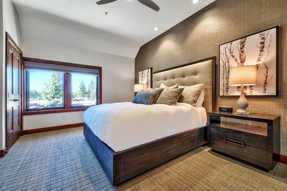 Large country master bedroom in Other with beige walls, carpet, no fireplace and beige floor.