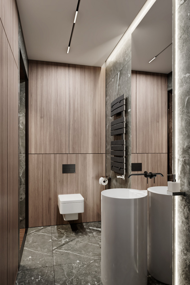 Photo of a mid-sized contemporary 3/4 bathroom in Miami with white cabinets, a wall-mount toilet, brown tile, brown walls, grey floor and a single vanity.