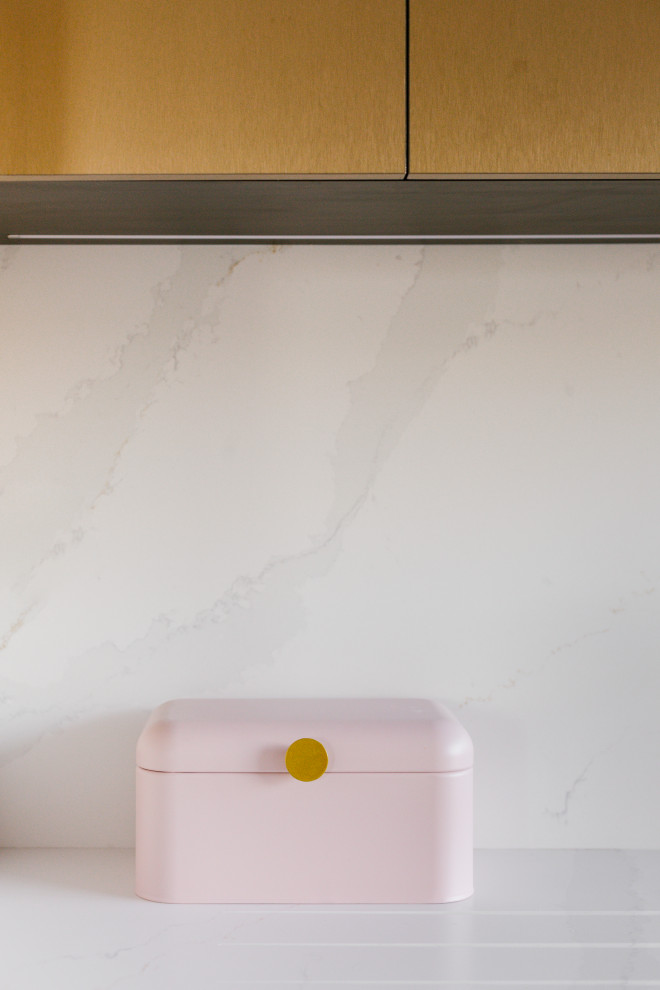 Design ideas for a medium sized scandi kitchen in Paris with beige cabinets, quartz worktops, white splashback, engineered quartz splashback, black appliances and white worktops.