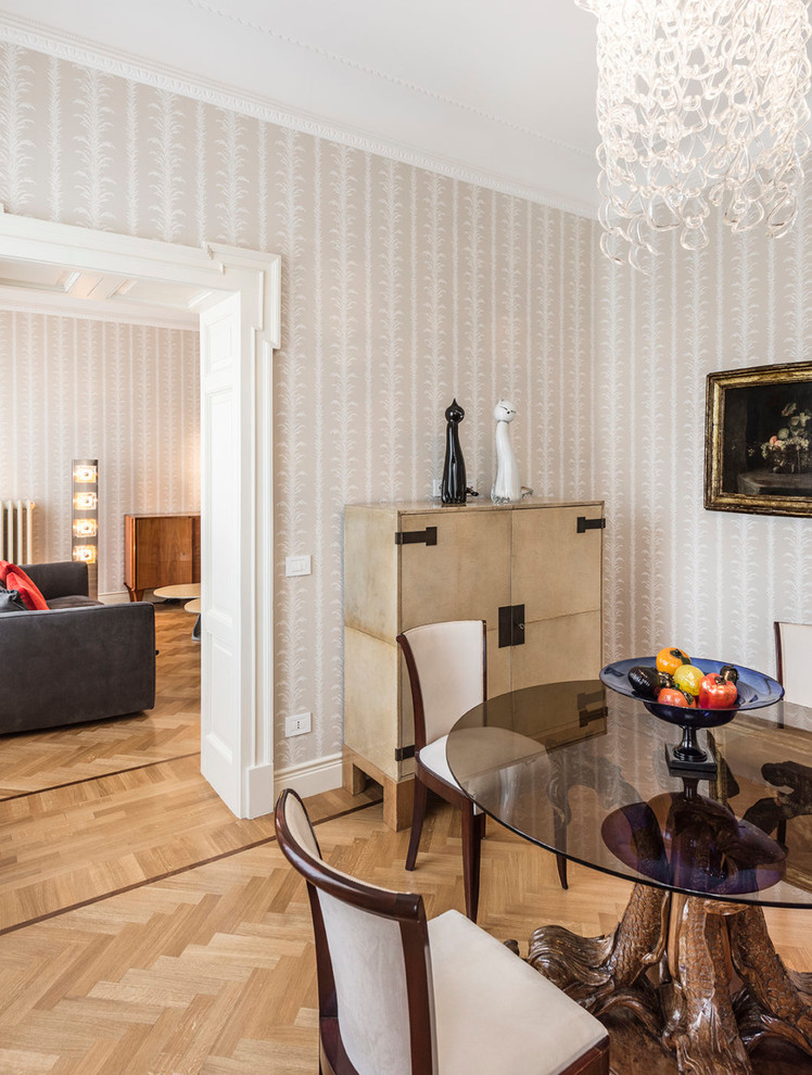 Eclectic separate dining room in Venice with beige walls, light hardwood floors and beige floor.
