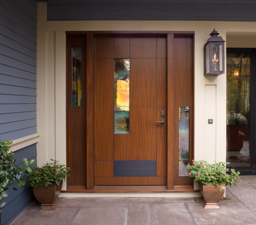 Expansive transitional front door in Chicago with slate floors, a single front door and a medium wood front door.