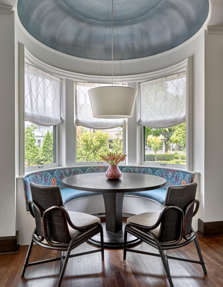 Inspiration for a large transitional dark wood floor and brown floor breakfast nook remodel in Chicago with white walls