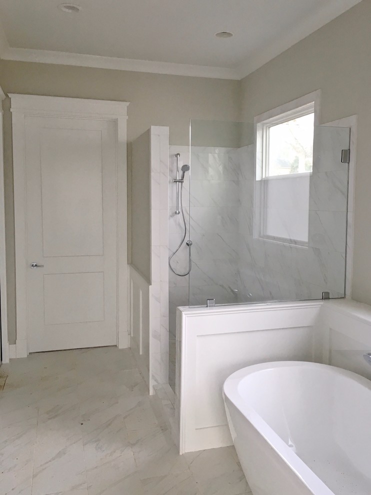 Mid-sized transitional master bathroom in Other with a freestanding tub, an alcove shower, white tile, beige walls and an open shower.