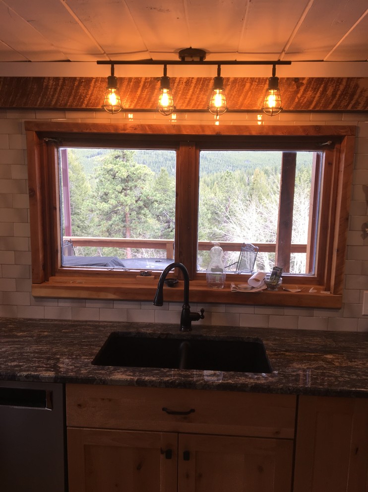 Inspiration for a rustic home design remodel in Denver
