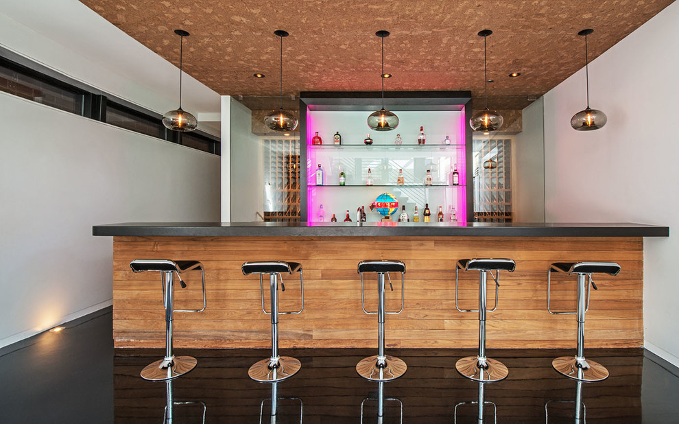 Inspiration for a contemporary galley seated home bar in Chicago with open cabinets.