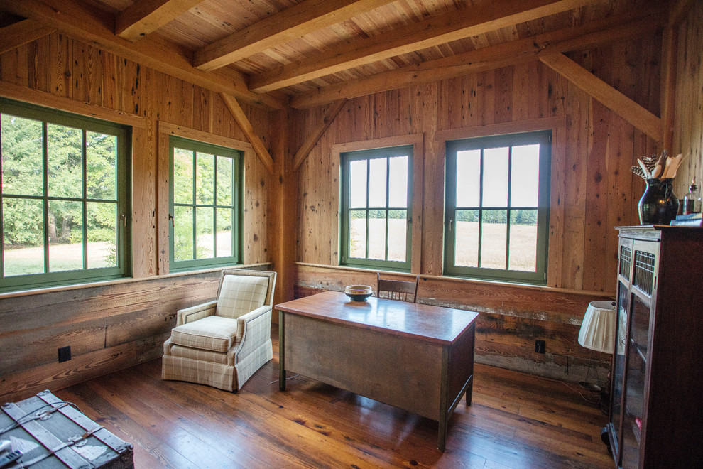 Photo of a mid-sized country home office in Atlanta with medium hardwood floors and a freestanding desk.