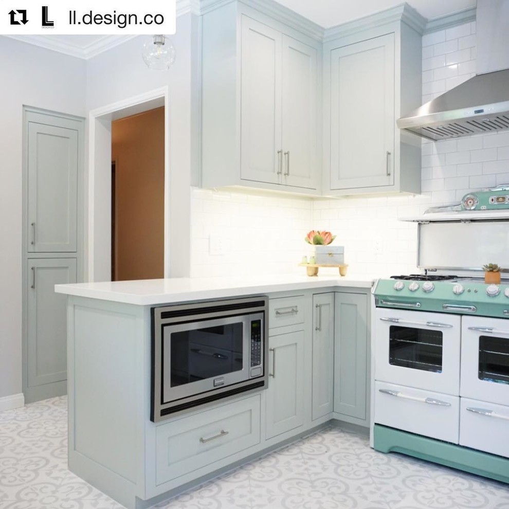 Example of a cement tile floor and gray floor kitchen design in Orange County