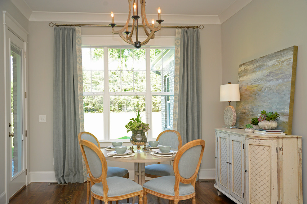 Inspiration for a traditional dining room in Other with grey walls, dark hardwood floors and brown floor.