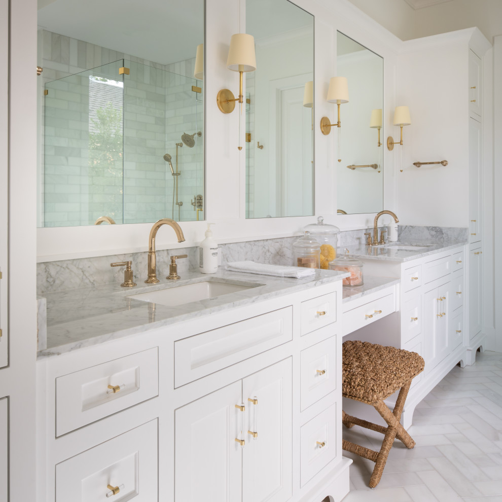 Example of a large transitional master white tile and marble tile marble floor, white floor, double-sink and coffered ceiling bathroom design in Dallas with shaker cabinets, white cabinets, a one-piece toilet, white walls, an undermount sink, marble countertops, a hinged shower door, white countertops and a built-in vanity