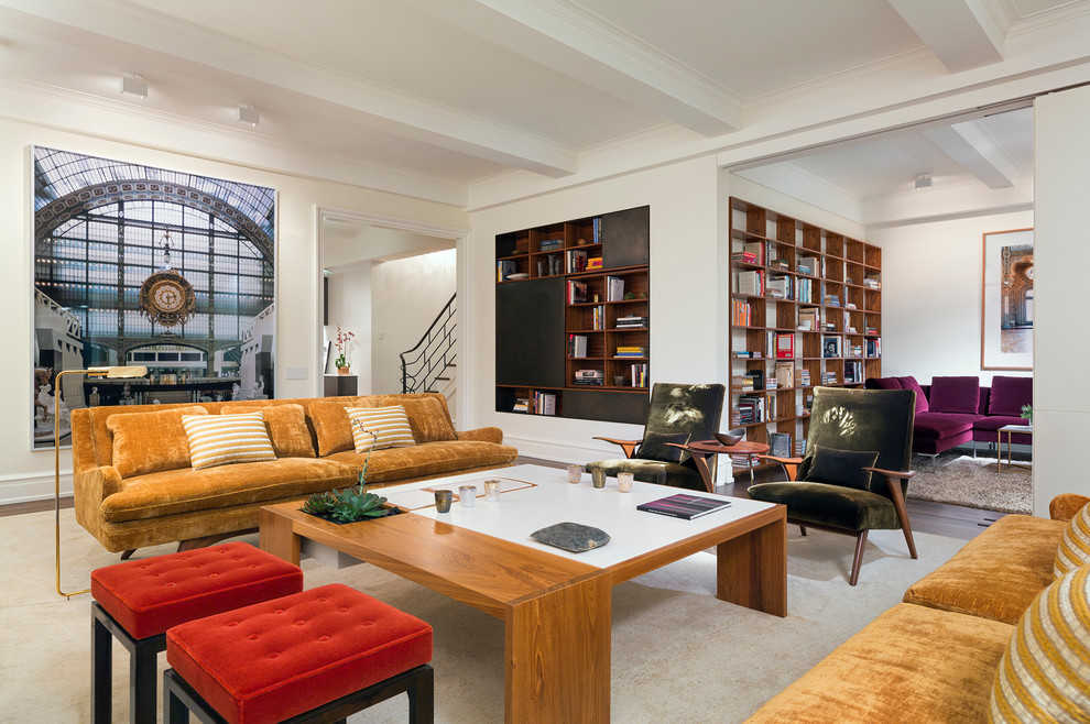 Large contemporary open concept living room in New York with white walls.