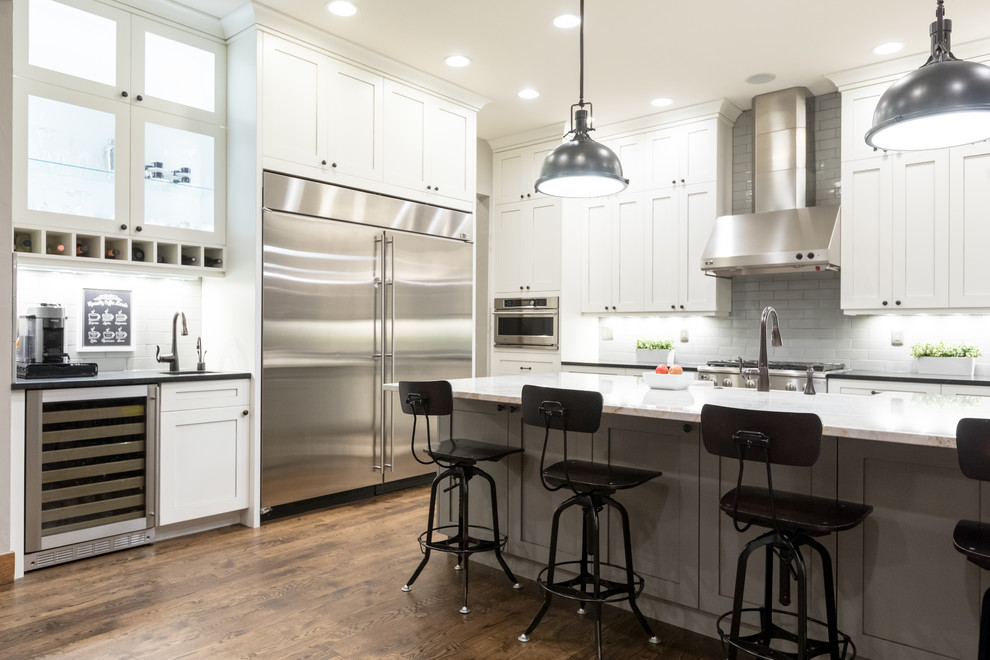 Large transitional l-shaped eat-in kitchen photo in Denver