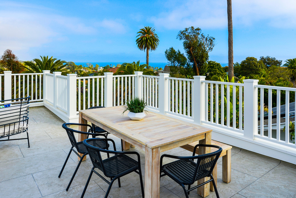 This is an example of a mid-sized beach style rooftop and rooftop deck in Orange County with no cover.