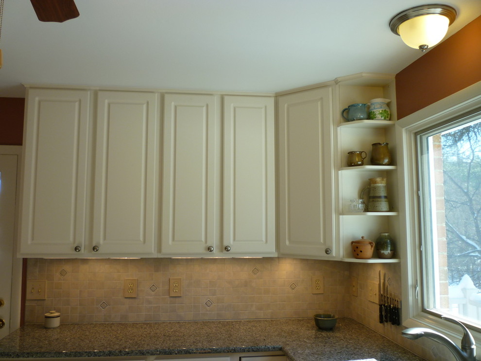 Mid-sized l-shaped kitchen photo in Richmond with a drop-in sink, white cabinets and granite countertops