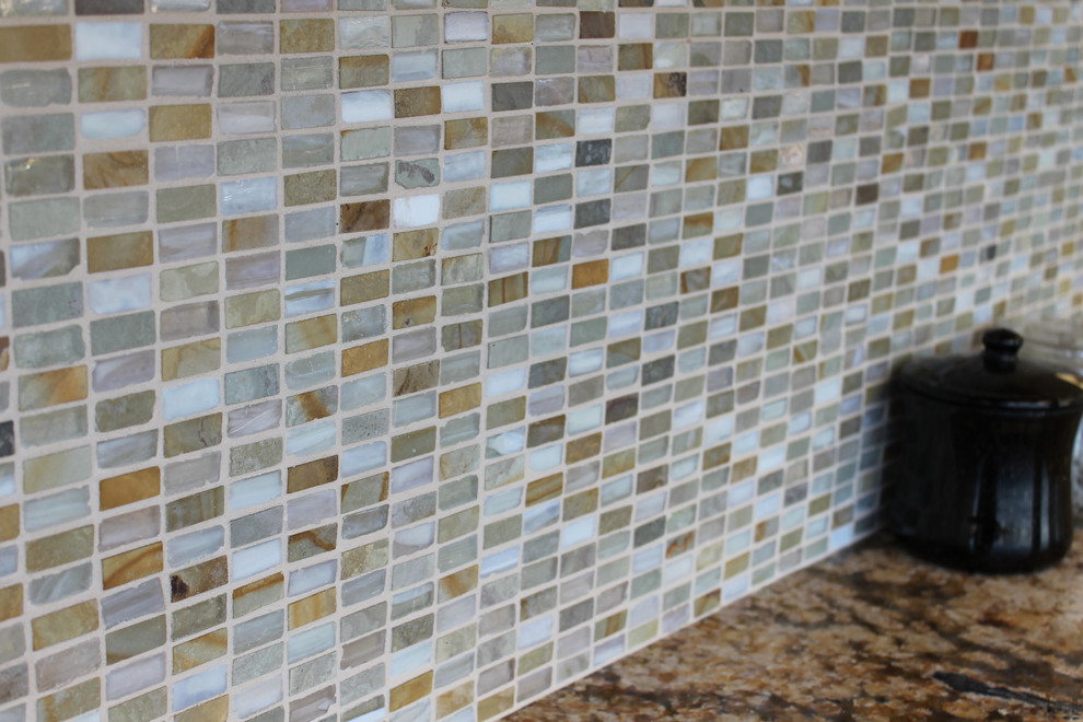 Small kitchen photo in New York with multicolored backsplash and glass tile backsplash