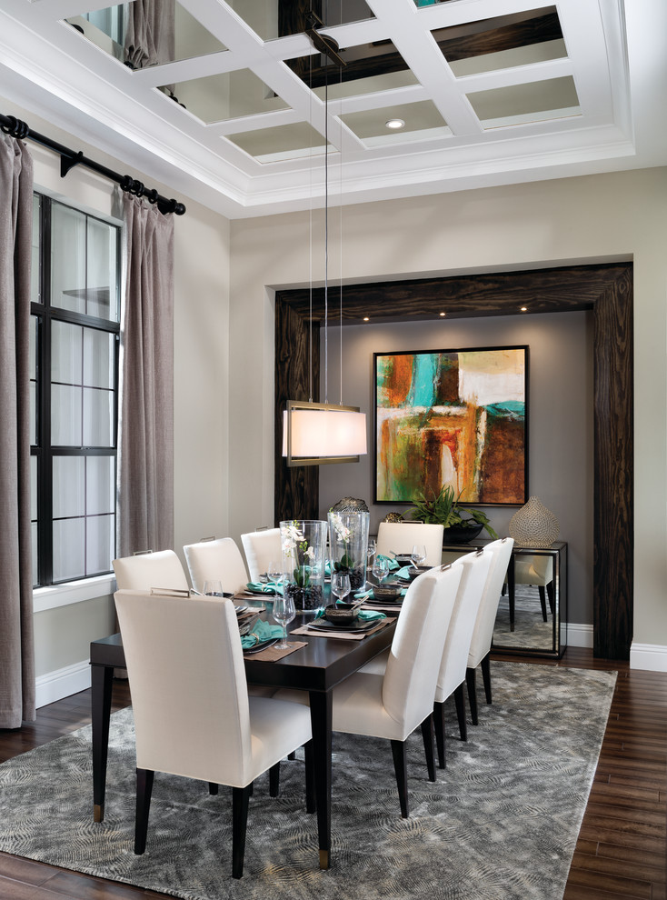 Transitional dark wood floor dining room photo in Orlando with gray walls
