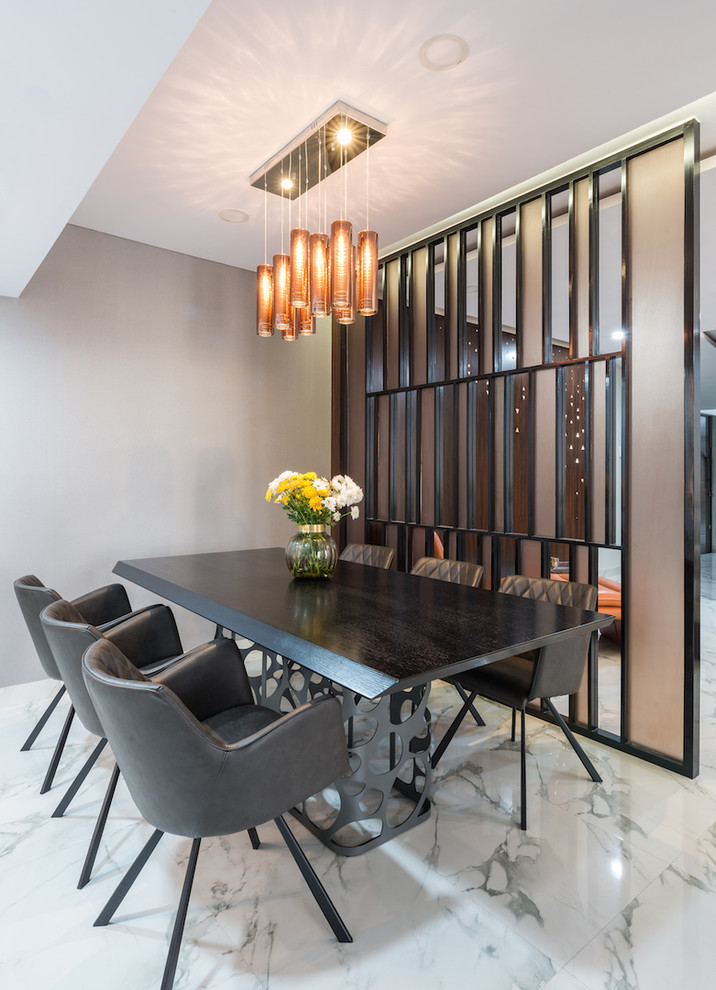 Contemporary dining room in Mumbai with grey walls, marble floors and white floor.