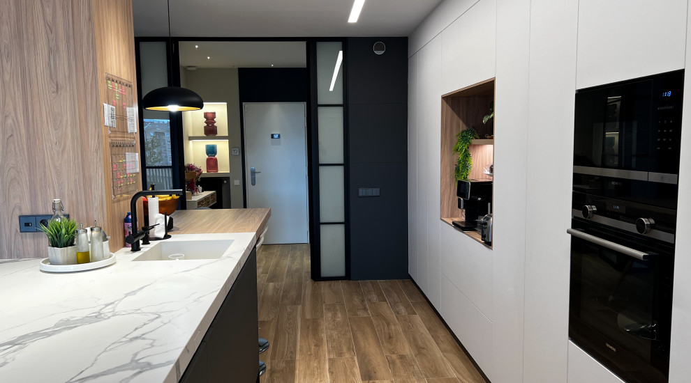 Cocina integrada a Salón en Igualada