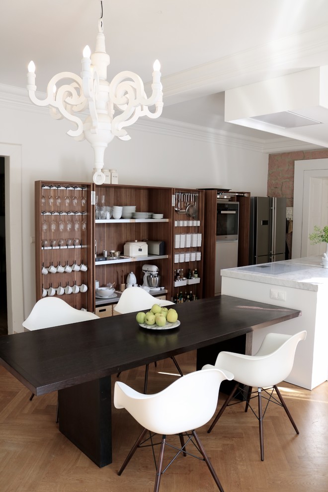 Large contemporary single-wall eat-in kitchen in Frankfurt with an integrated sink, open cabinets, dark wood cabinets, marble benchtops, white splashback, stainless steel appliances, medium hardwood floors and with island.