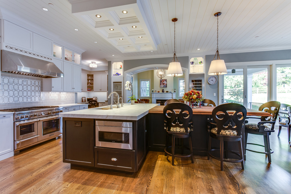 Inspiration for a large transitional kitchen remodel with an island