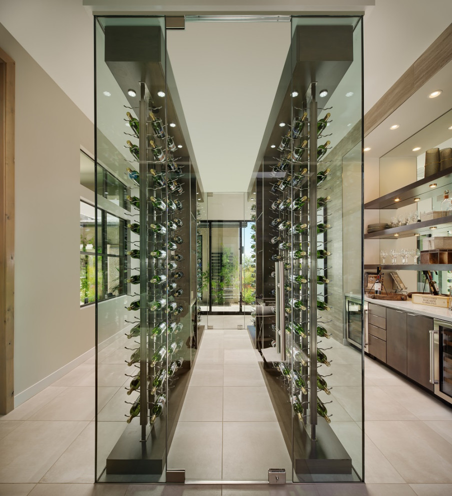 Medium sized modern wine cellar in Phoenix with ceramic flooring, storage racks and multi-coloured floors.