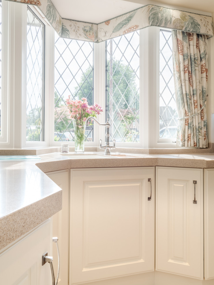 Design ideas for a small traditional kitchen in West Midlands.