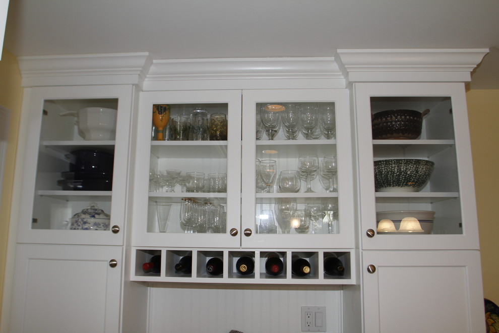 Example of a transitional home design design in Boston