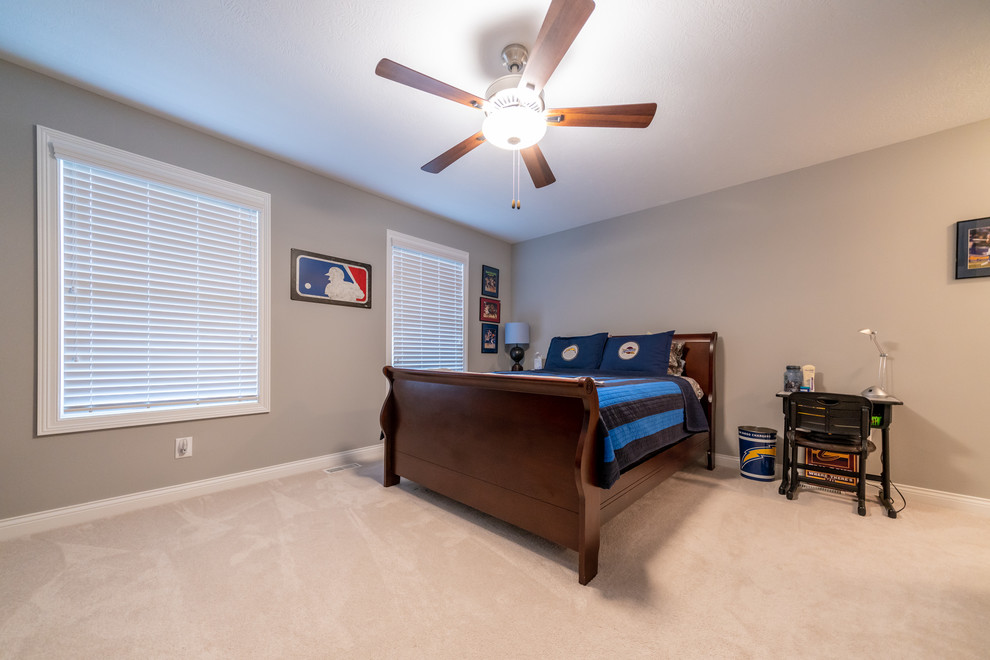 Example of a transitional bedroom design in Cleveland