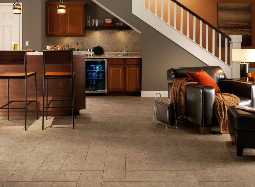Example of a large trendy vinyl floor and brown floor basement design with gray walls and no fireplace