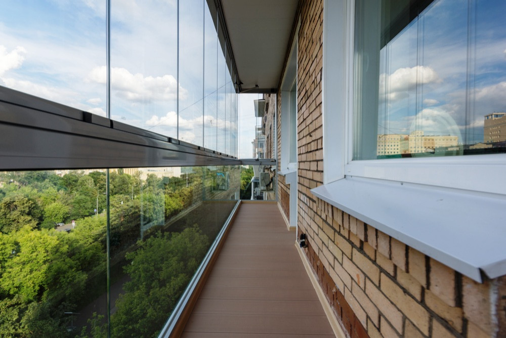 Алюминиевый профиль безрамного остекления