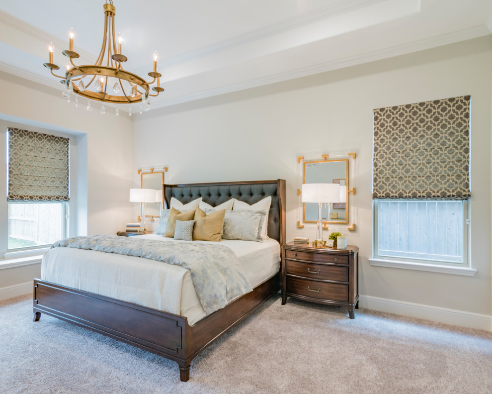 Inspiration for a large transitional master bedroom in Houston with white walls, carpet, beige floor and recessed.