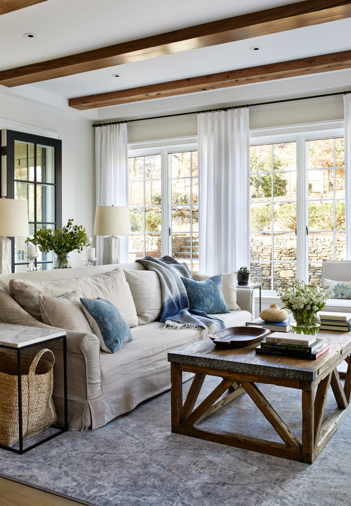Family room - large transitional open concept light wood floor and white floor family room idea in DC Metro with a standard fireplace, a stone fireplace, no tv and white walls