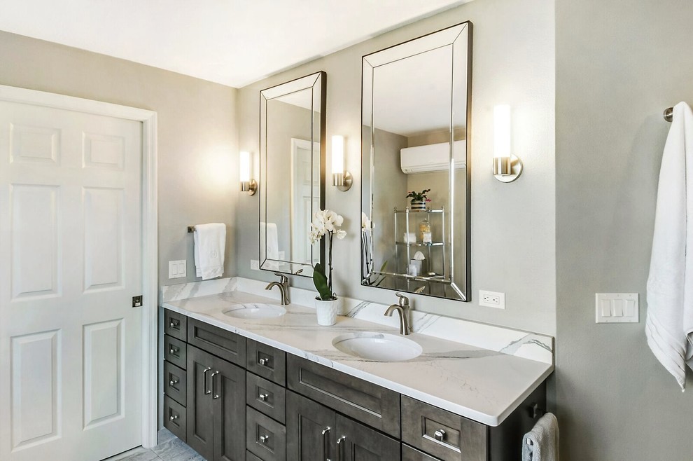 Traditional bathroom in Other with flat-panel cabinets, grey cabinets and granite benchtops.