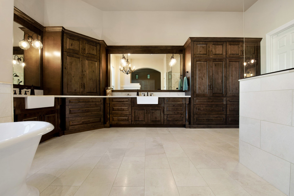 Design ideas for a large transitional master bathroom in Phoenix with raised-panel cabinets, medium wood cabinets, a freestanding tub, a double shower, a one-piece toilet, beige tile, ceramic tile, beige walls, ceramic floors, an undermount sink, quartzite benchtops, beige floor and an open shower.