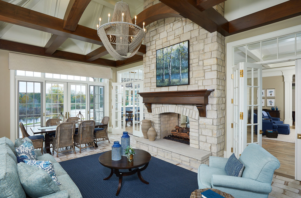 Design ideas for a conservatory in Grand Rapids with ceramic flooring, a two-sided fireplace, a stone fireplace surround, beige floors and feature lighting.