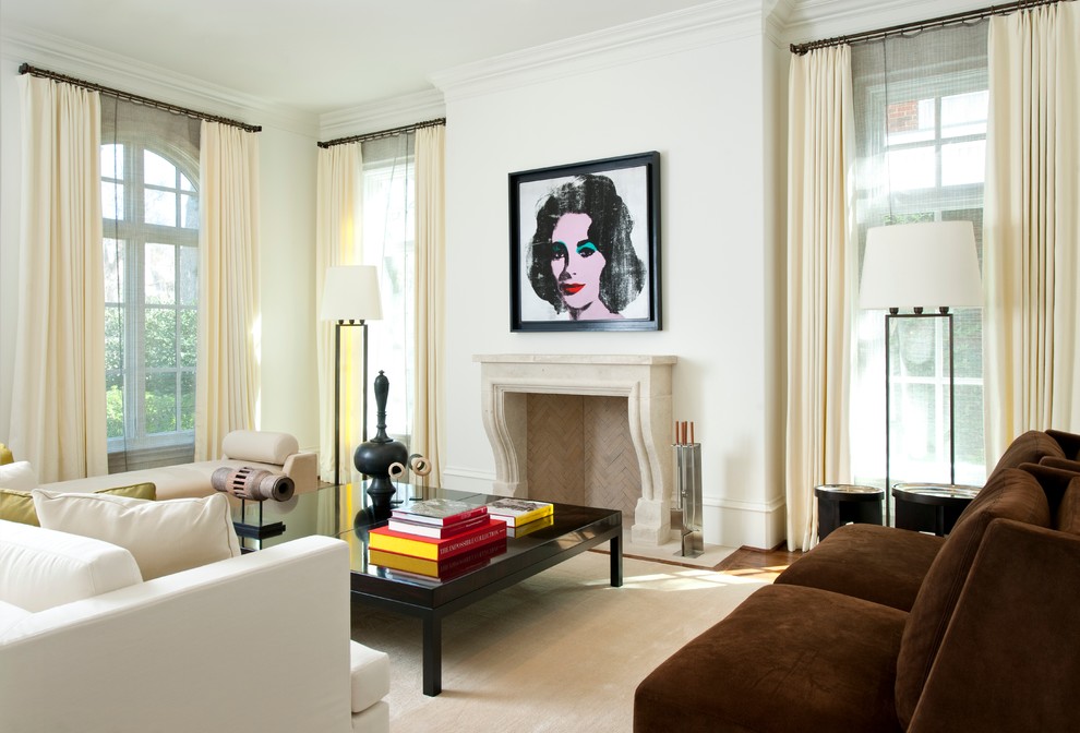 Photo of a mediterranean living room in Dallas with white walls.