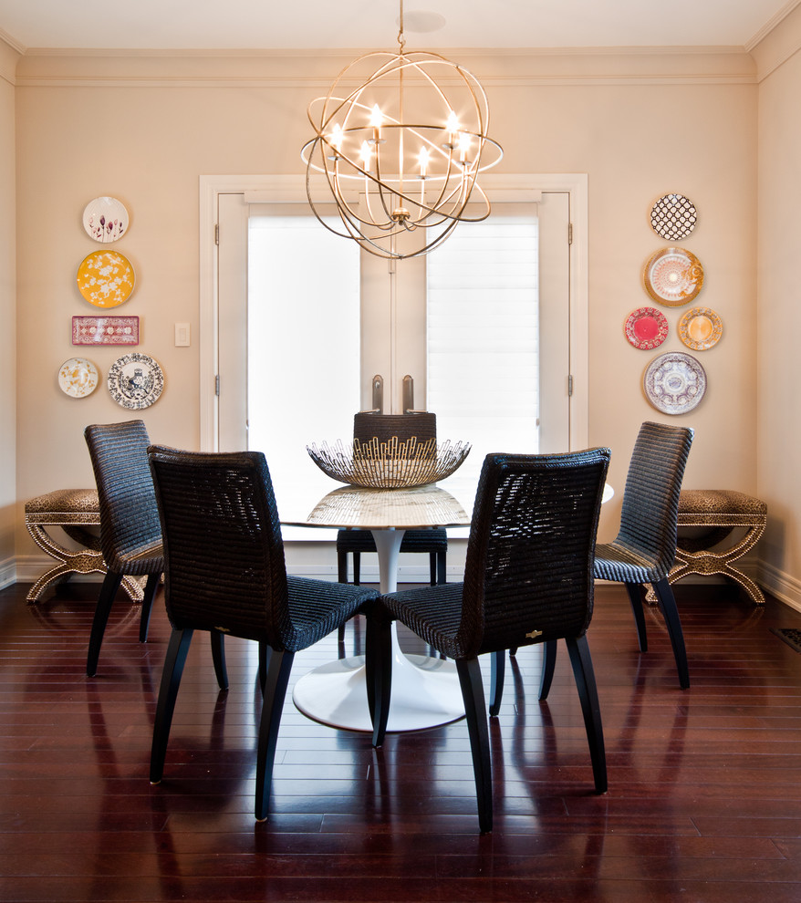 Inspiration for a contemporary dining room in Toronto with beige walls and dark hardwood floors.