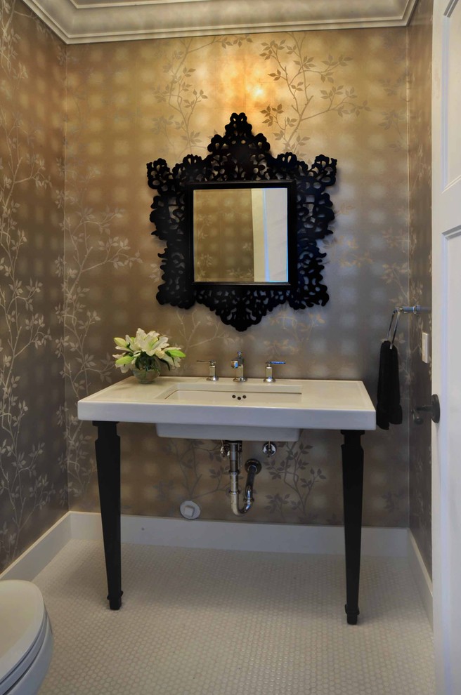 This is an example of a mid-sized traditional powder room in Vancouver with white tile, brown walls, a console sink and white benchtops.