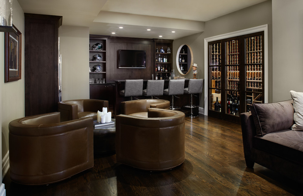 Photo of a contemporary seated home bar in Chicago with dark wood cabinets, medium hardwood floors, brown floor and open cabinets.