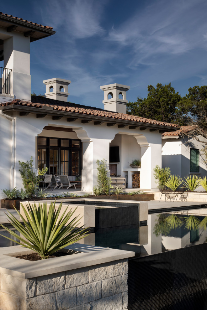 Example of a transitional exterior home design in Austin