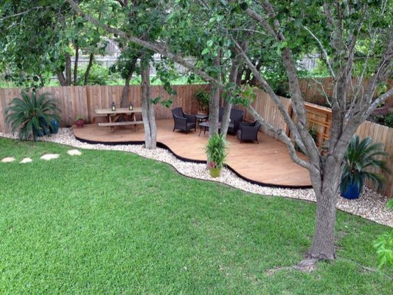 Inspiration for a mid-sized transitional backyard deck remodel in Seattle with no cover