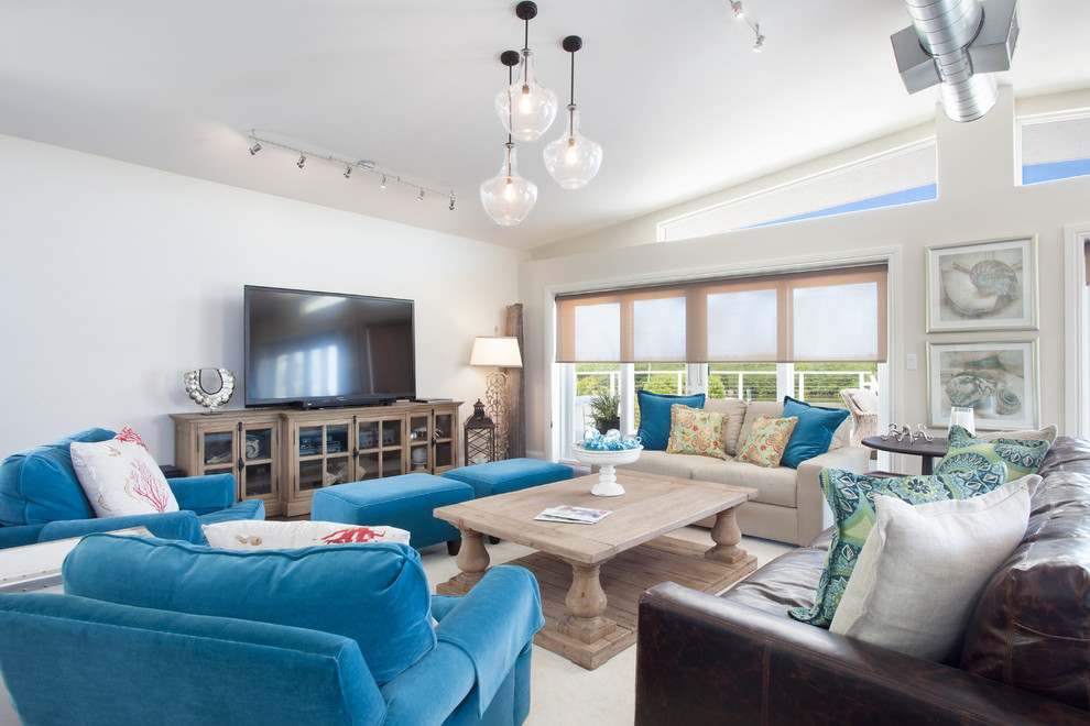 Photo of a mid-sized beach style formal open concept living room in Miami with a freestanding tv, white walls, carpet, no fireplace and white floor.