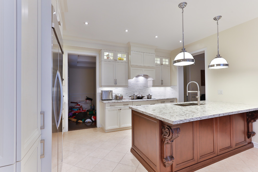 Example of a transitional kitchen design in Toronto
