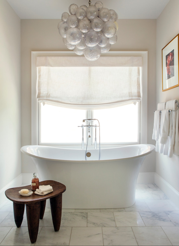 Design ideas for a transitional bathroom in Dallas with a freestanding tub.